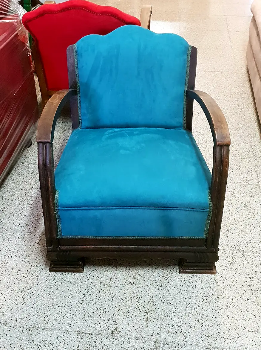 Wooden armchair upholstered in turquoise velvet